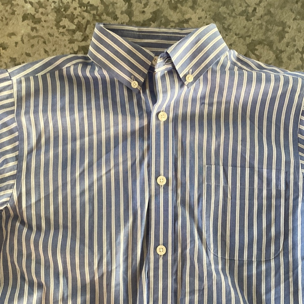 Cute and classic blue and white striped button down shirt. Perfect condition.